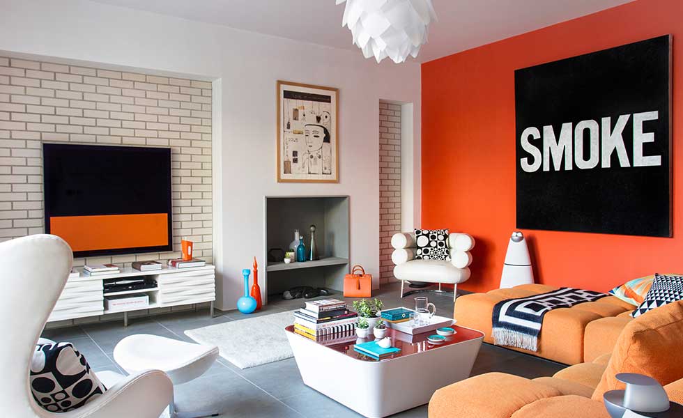 Orange-AMARA-Living-room-with-brick